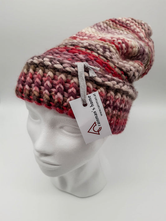 Strickhaube in Rosa-Tönen